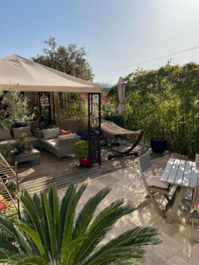 RDC de maison avec terrasse barbecue